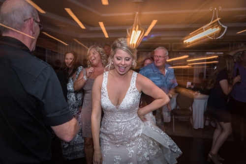 Bride dancing at Ashburn Golf club wedding reception.