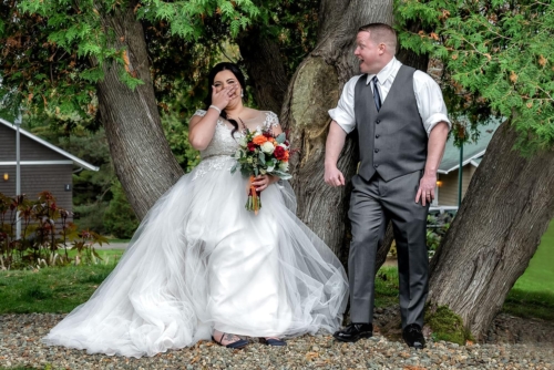 Celebrate love with professional Halifax wedding photography services. Bride and groom sharing a joyful moment outdoors in Halifax.